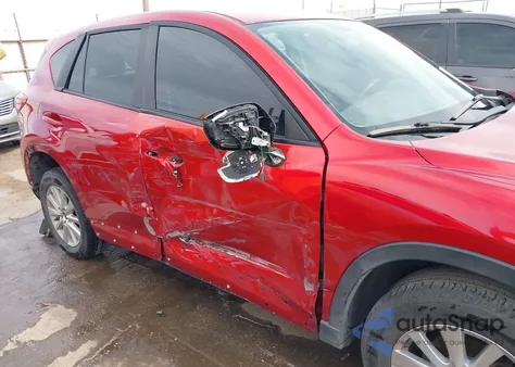 2015 Mazda Cx-5 Touring z USA, uszkodzony, nr VIN JM3KE2CY4F0447986